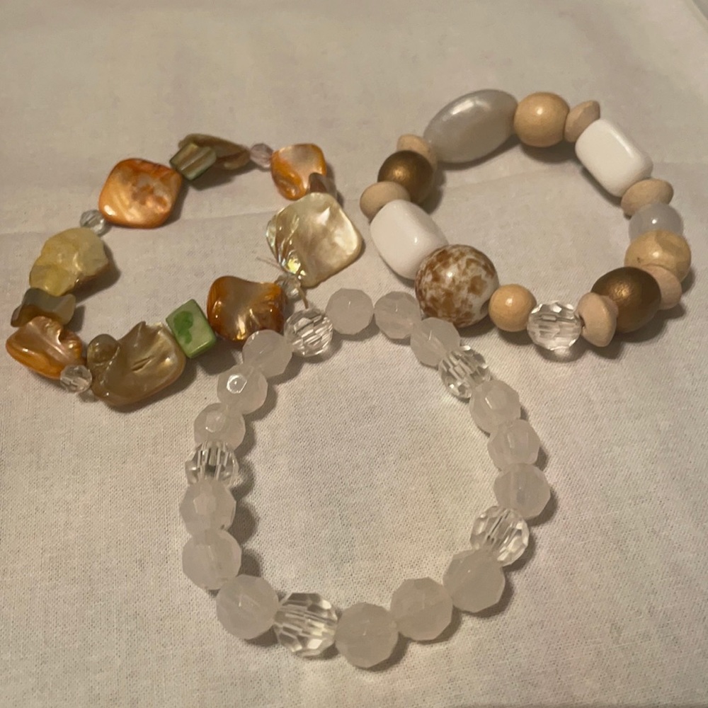 Three fashion bracelets.